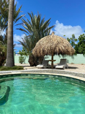 Charming 2-Bedroom Apartment with Saltwater Pool